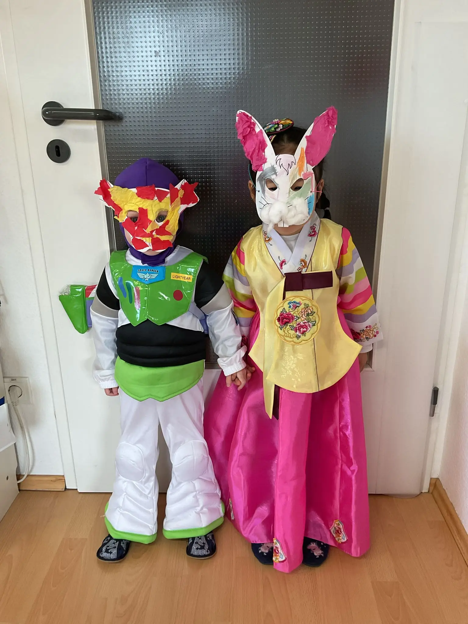 Children dressed in costumes, including Buzz Lightyear and a hanbok, for costume day